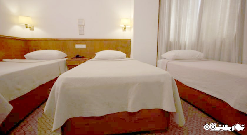 نمای تخت های اتاق تریپل